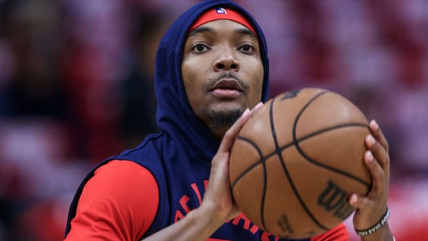 Apr 24, 2022; New Orleans, Louisiana, USA; New Orleans Pelicans guard Devonte Graham (4) warms up against the Phoenix Suns before game four of the first round of the 2022 NBA playoffs at Smoothie King Center. Mandatory Credit: Stephen Lew-USA TODAY Sports